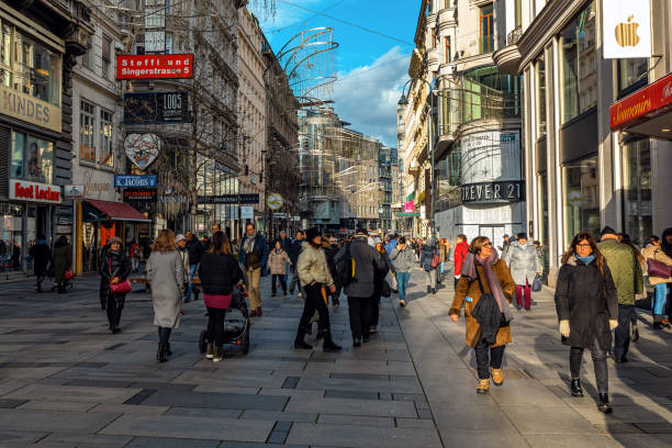Vienna, Austria - December 03, 2019: People walking on Karntner strabe - most famous shopping street in central Vienna.