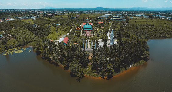 Aerial view of Hoa Nghiem Pagoda in Bao loc city, Lam Dong province, Vietnam. This pagoda is located on Bao Lam lake. Travel and religion concept.