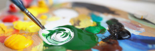 istock The palette contains a mixture paints for painting 1347020447