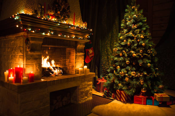 istock Living room interior with decorated fireplace and christmas tree 1347021435