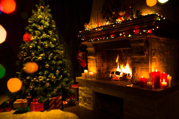 istock Atmospheric christmas card with tree, presents and fireplace 1347021436