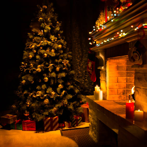 istock Atmospheric decorated fireplace with christmas tree 1347021447