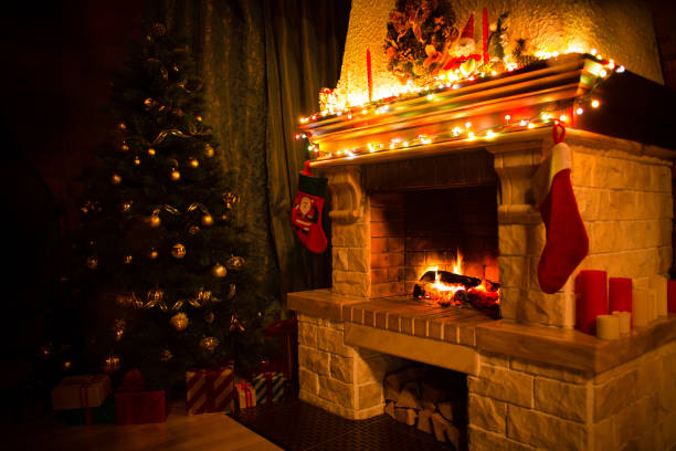 istock christmas interior with xmas tree, presents and fireplace 1347021469