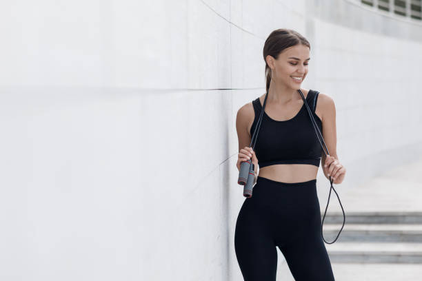 istock A slender beautiful girl warms up before training in the gym 1347024811