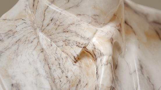 Close-up of neck and tie of a marble statue. 3D digital render
