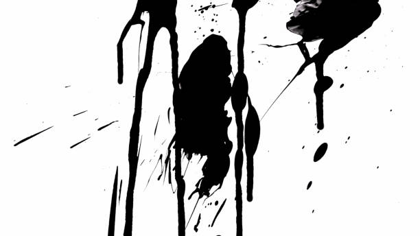 istock Thin trickles of spilled paint trickle down the white background. Isolated black ink drips onto white paper and forms flow and streams. Spilled paint close up. Slow motion ready 59.94fps 1347027646