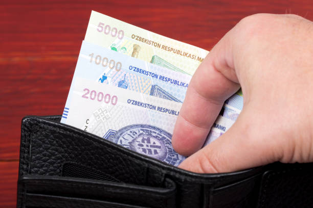 istock Uzbekistani money in the black wallet 1347028651