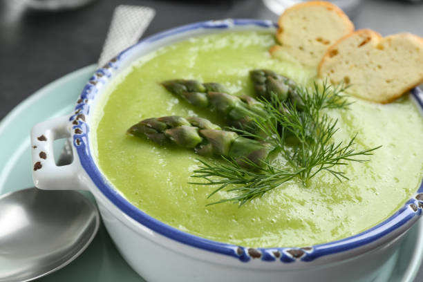 istock Delicious asparagus soup served in bowl, closeup 1347029015