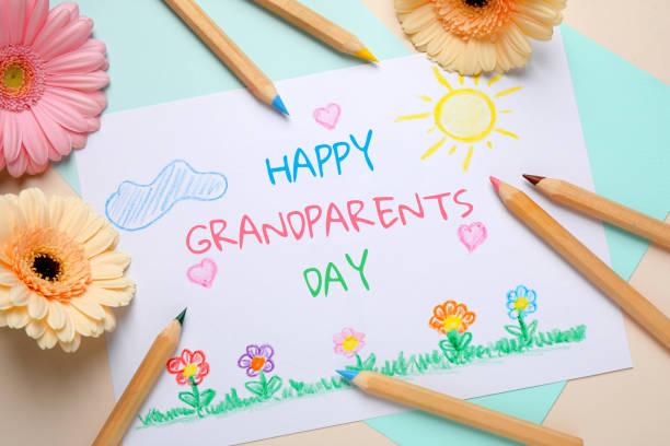 istock Flat lay composition with drawing for Grandparents day on table 1347029049
