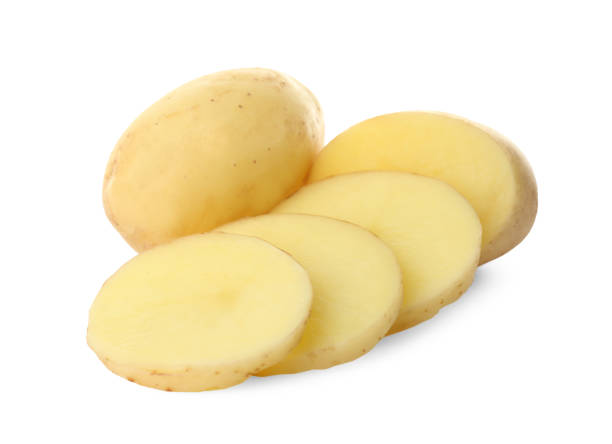 istock Whole and cut fresh raw organic potatoes on white background 1347029101