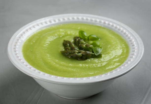 istock Delicious asparagus soup on grey table, closeup 1347030198