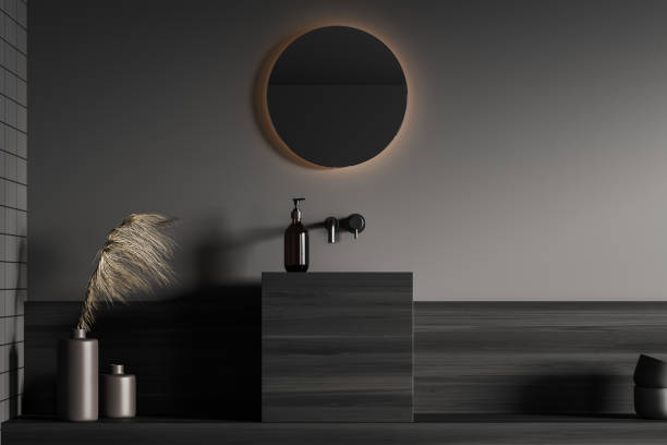 istock Close view on dark bathroom interior with grey wall 1347032165