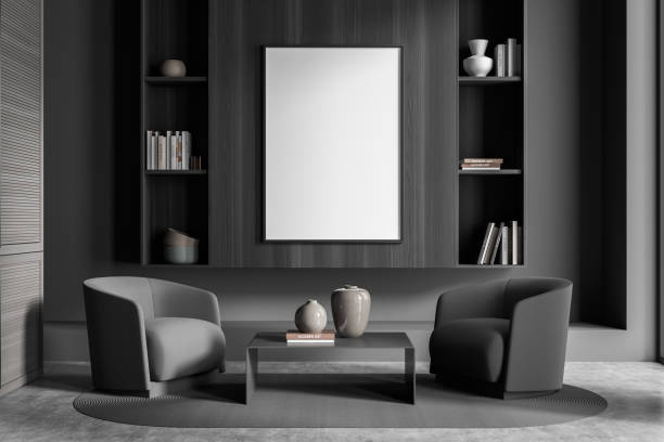 istock Stylish shelf with mockup canvas in dark grey seating area 1347032317