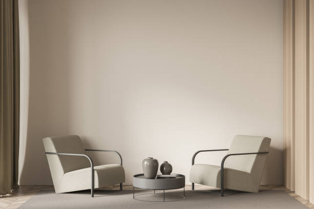 istock Bright waiting room interior with comfortable armchairs and empty wall 1347032579