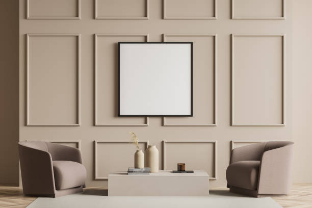 istock Beige living room with empty canvas and two light brown armchairs 1347032628