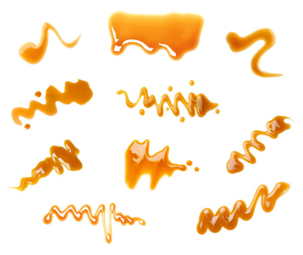 istock Set with samples of caramel sauce on white background 1347033396