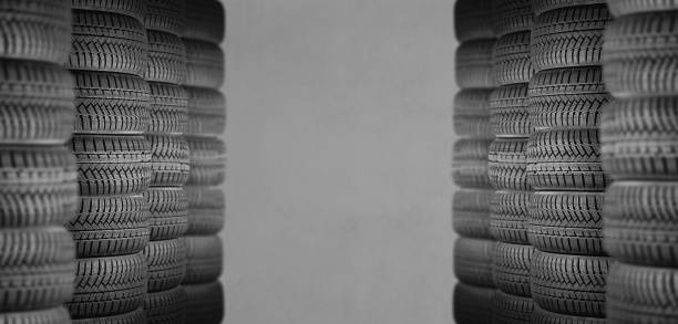 a stack of car tires isolated on a white background - street fog profile imagens e fotografias de stock