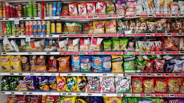 Various of snack sold on the rack in Singapore Singapore- 05 Jan, 2020: Various of snack sold on the rack in Singapore. snack stock pictures, royalty-free photos & images