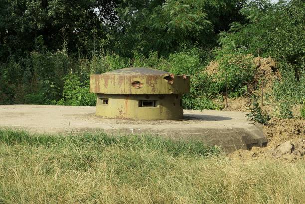 istock old military green rusty iron tower with embrasures on a gray concrete pillbox 1347048411