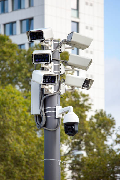 Surveillance cameras Surveillance cameras big brother orwellian concept stock pictures, royalty-free photos & images