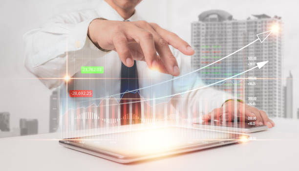 istock Interface goal chart, a businessman uses a tablet to analyze growth graph financial data and sales profit. In terms of return on investment, intelligent technology creates clever business solutions. 1347051958