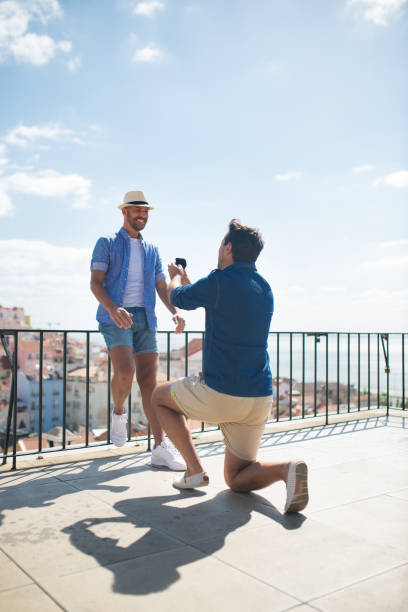 istock Back view of man proposing to boyfriend 1347052068