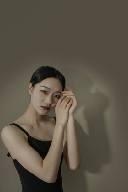 istock A dancer dressed in black practices her dance moves 1347054298