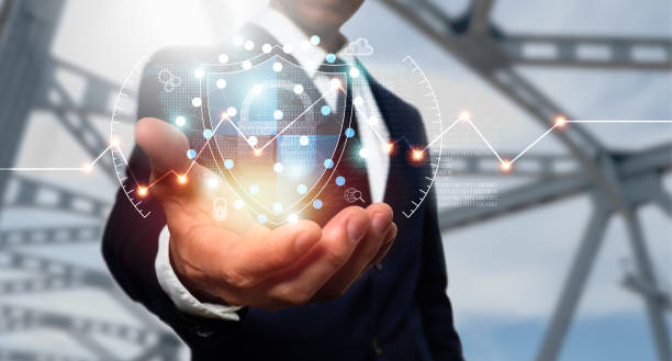 istock Cyber security and data protection. A businessman uses a virtual network connection to protect commercial and financial data with a padlock. Ingenious solutions are created by innovative technologies 1347054408