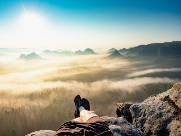 istock First person view to resting hiking legs, resting during hike. 1347056561