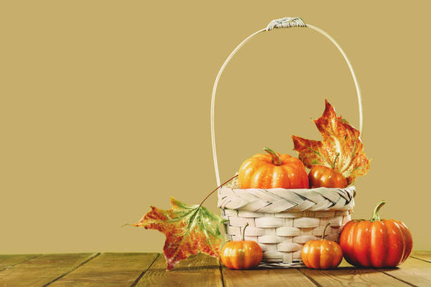 istock Orange halloween pumpkins with golden branches. Thanksgiving setup 1347057126