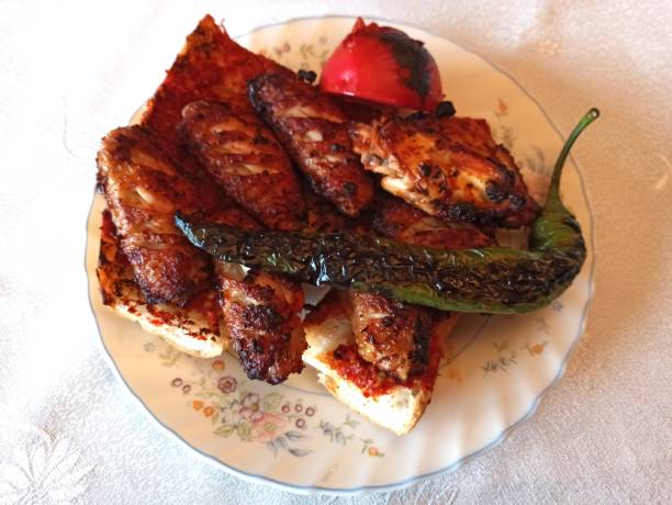istock Barbecued grill chicken wing served on bread in Istanbul turkey 1347057727