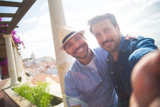 istock Gay couple taking selfie on vacation 1347060319