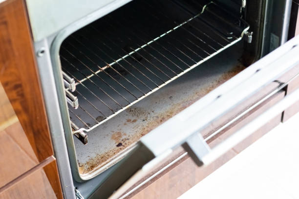 istock Dirty kitchen oven after cooking. The oven is greasy and stained 1347063679