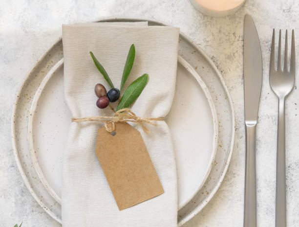 istock Wedding Table place with card decorated with olive branches 1347063802