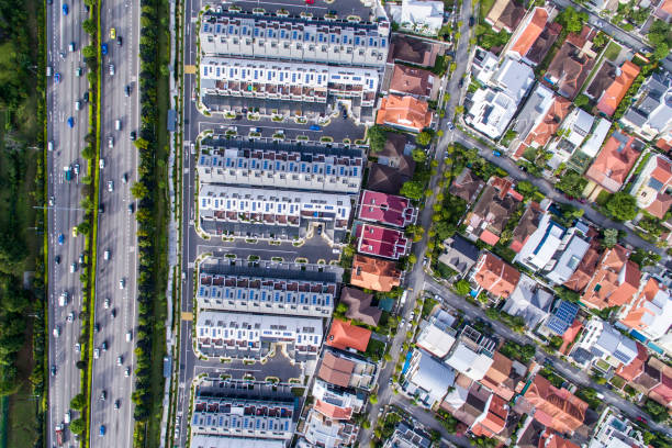 istock Drone aerial Top Down Highway and Residential 1347064585