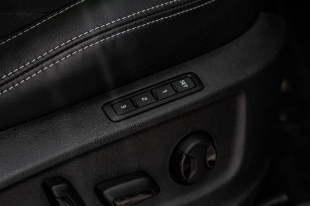 istock Electric car seat adjustment control panel close up view. Adjustable car seat position. Car interior. 1347064680