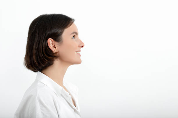 istock Young woman looking up 1347067403