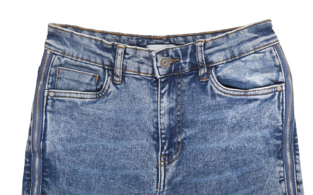 istock Blue jeans with zippers on the sides on a white background.Stack of various blue jeans on white background. Beauty and fashion, clothing concept. Detail of nice blue jeans. Jeans texture or denim back 1347072593