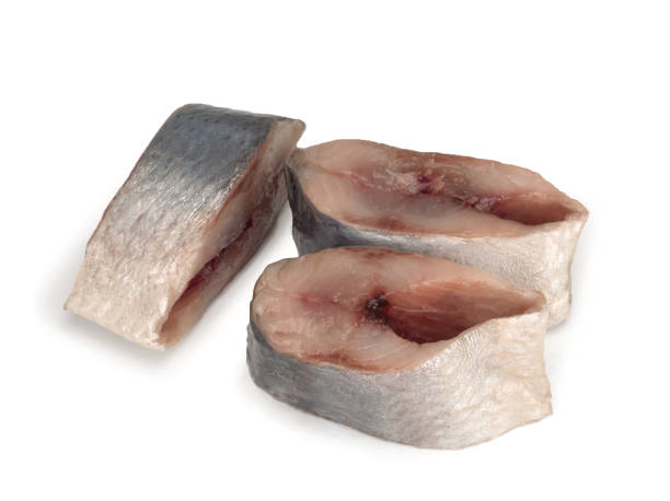 istock Lightly salted Norwegian herring, isolated on white background. 1347073190