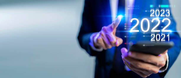 istock Business man press finger on  mobile phone, company corporate management data dashboard data analytics, sale, performance, productivity, KPI. Business  information technology 2022 new year concept 1347074726