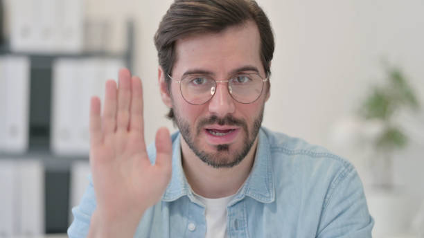 istock Portrait of Video Call by Young Man 1347075982