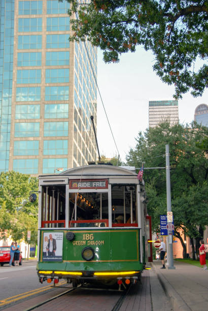 Head on view of the vintage street tram on McKinney Avenue in downtown Dallas Dallas, Texas, USA - September 2009: Vintage trolley car on the McKinney Avenue trolley tram system trolley bus stock pictures, royalty-free photos & images