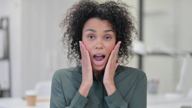 istock African Woman having Loss while using Laptop 1347079029