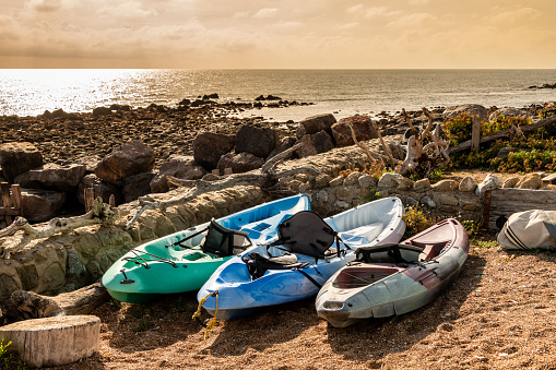 Kayaks by the coast