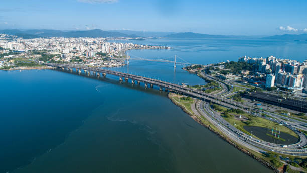 Aerial view of the two bridges connecting the mainland to the island of Florianópolis. Aerial view of the two bridges connecting the mainland to the island of Florianópolis. Brazil. southern brazil photos stock pictures, royalty-free photos & images