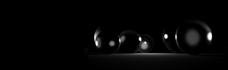 Abstract monochrome background with different white transparent glass balls over black. Creative layout for display products. Copy space, 3d render. Banner size