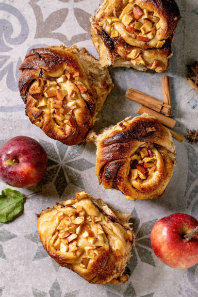 istock Sweet apple cinnamon buns. Traditional home bakery 1347082727