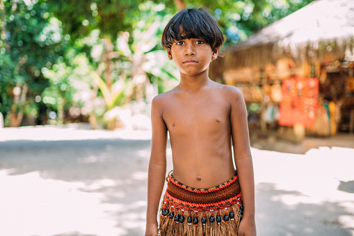 young Indian from the Pataxo tribe of southern Bahia. Indian child looking at the camera. Focus on the face