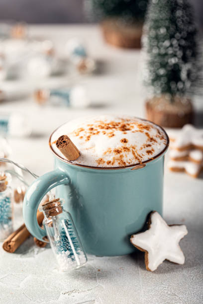 istock Cup of cappuccino in blue mug 1347086097