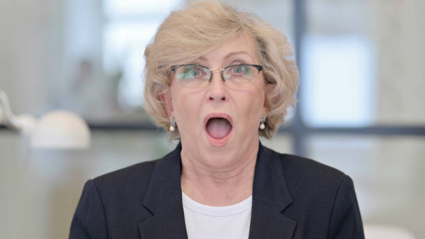 istock Old Businesswoman Disappointed by Loss, Failure 1347086105